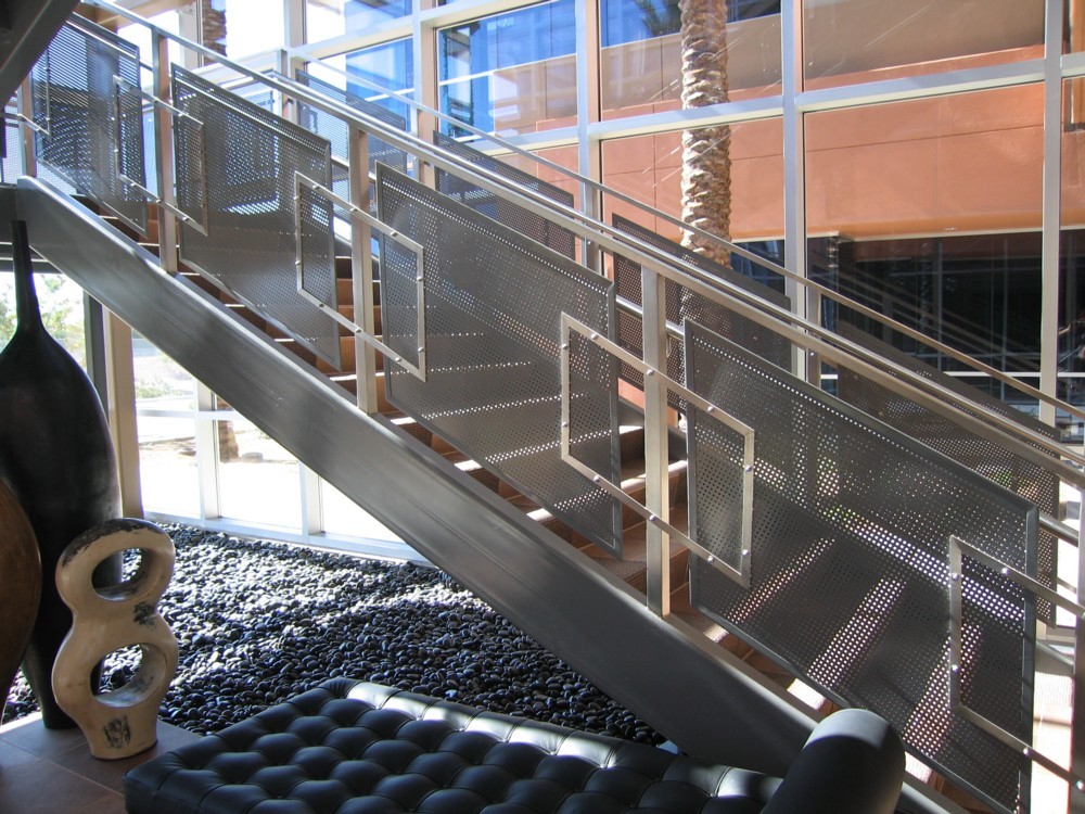 Pima Commerce Center - painted steel perf metal with stainless steel post, cap rail, handrail and trim.