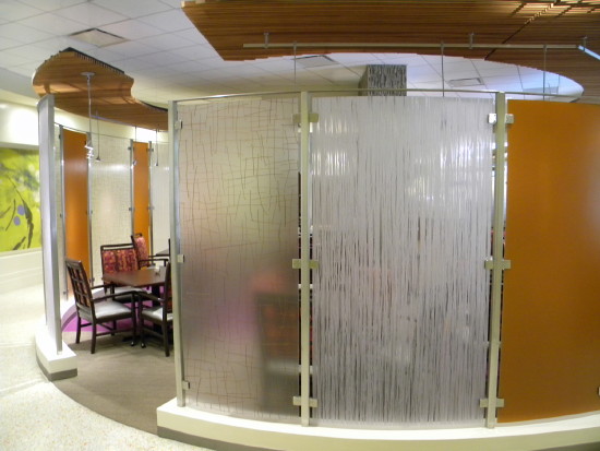 Sagewood. Stainless steel and plastic room divider.