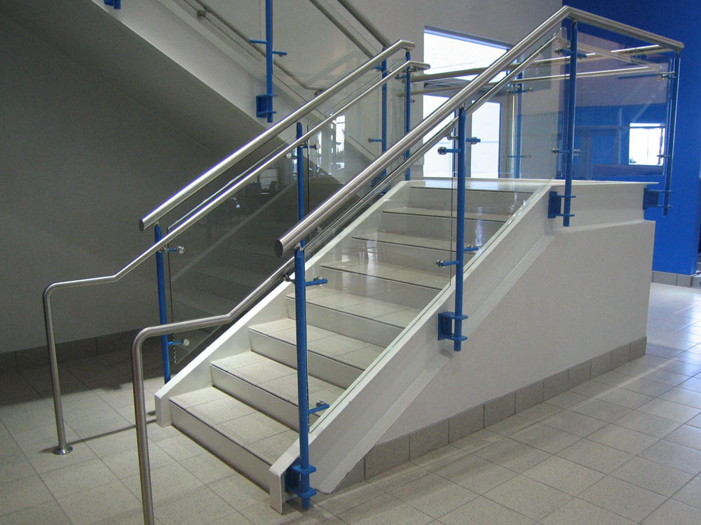 Santan Honda. Painted steel, glass, and stainless handrail.