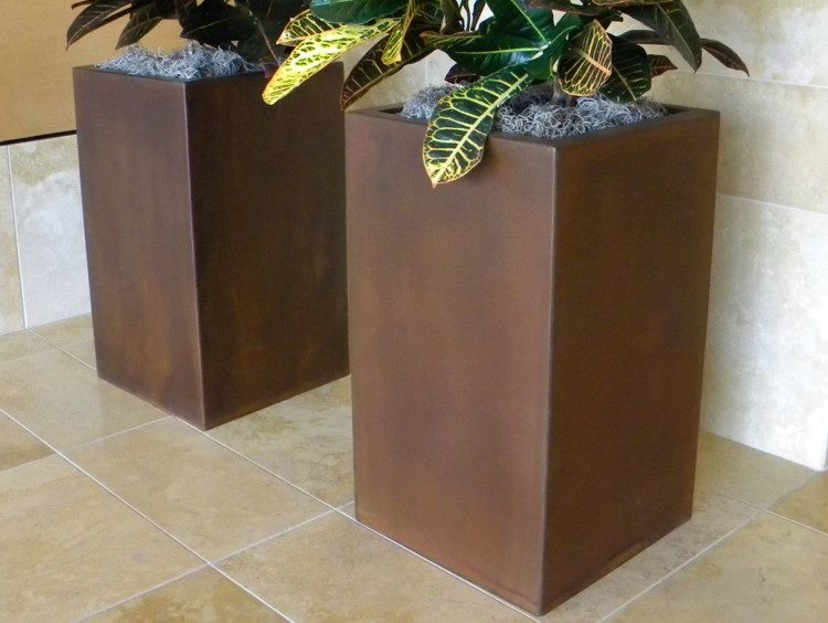 Allred. Steel planters with custom finish.