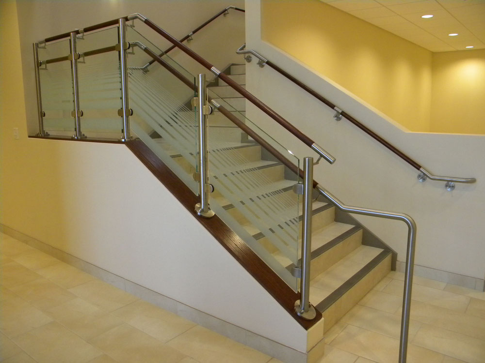 St. Bernards Parish - glass with stainless steel post. Stainless steel and wood handrail.