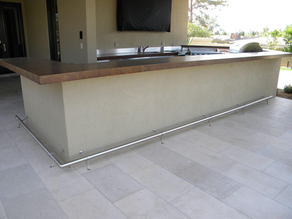 Private residence. Stainless steel two leg support.