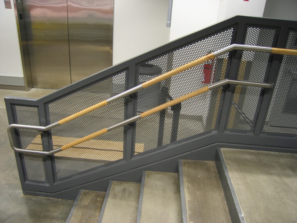 IKEA - painted steel post and perf metal. Stainless steel and wood handrail.