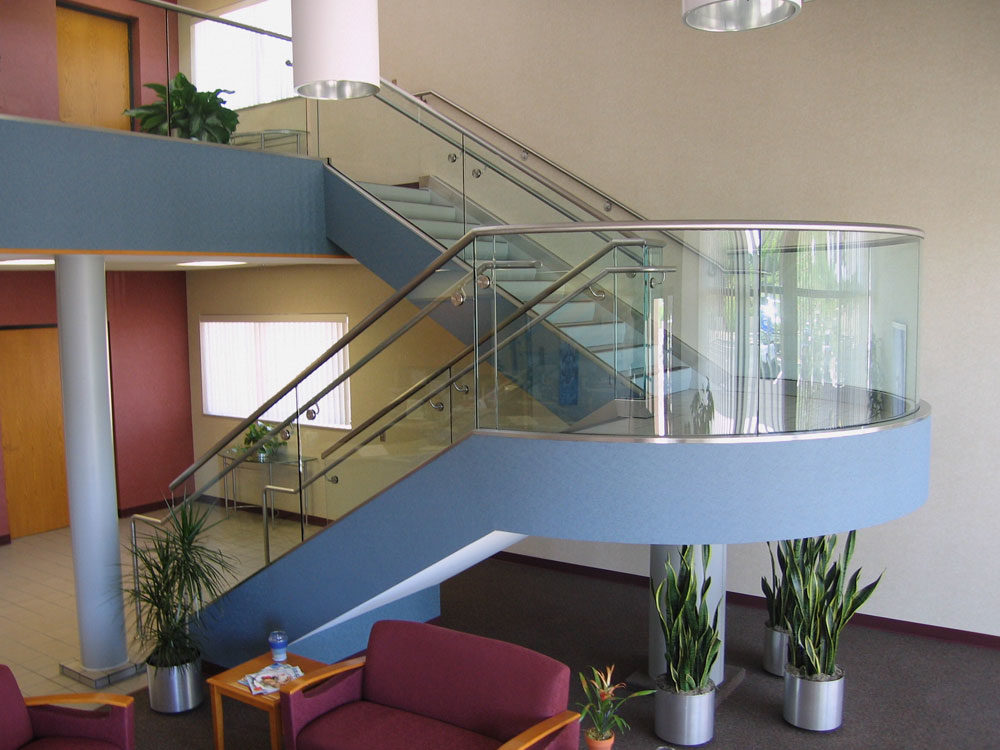 Chandler Water Treatment Center - Radius glass and shoe with stainless steel handrail and cap rail.