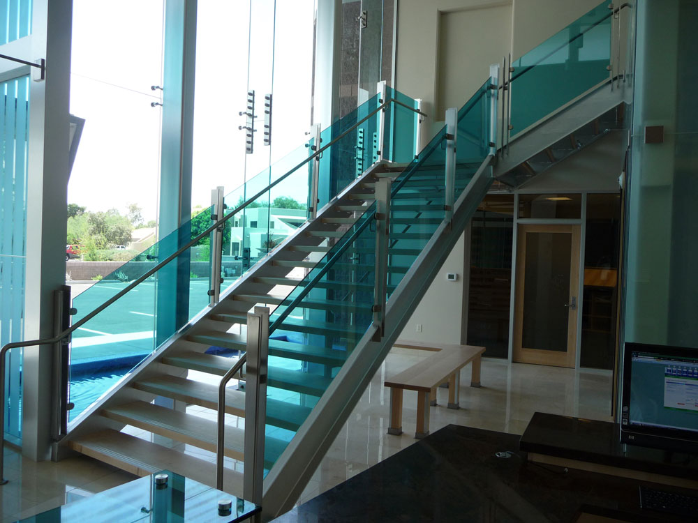 Clayton National Headquarters - tinted glass with stainless steel post and handrail.