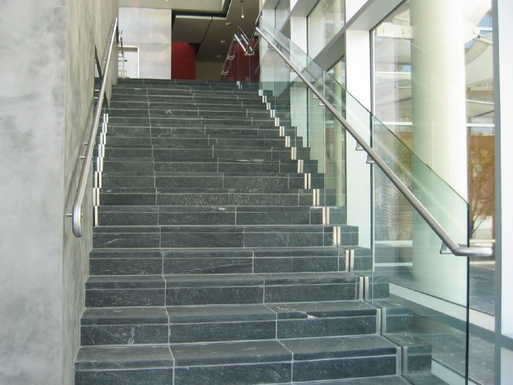 Mesa Arts Center - Glass in shoe with stainless steel handrail and trim.