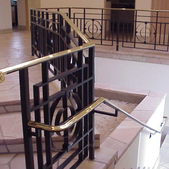 Private residence - Painted steel with brass top cap and handrail.