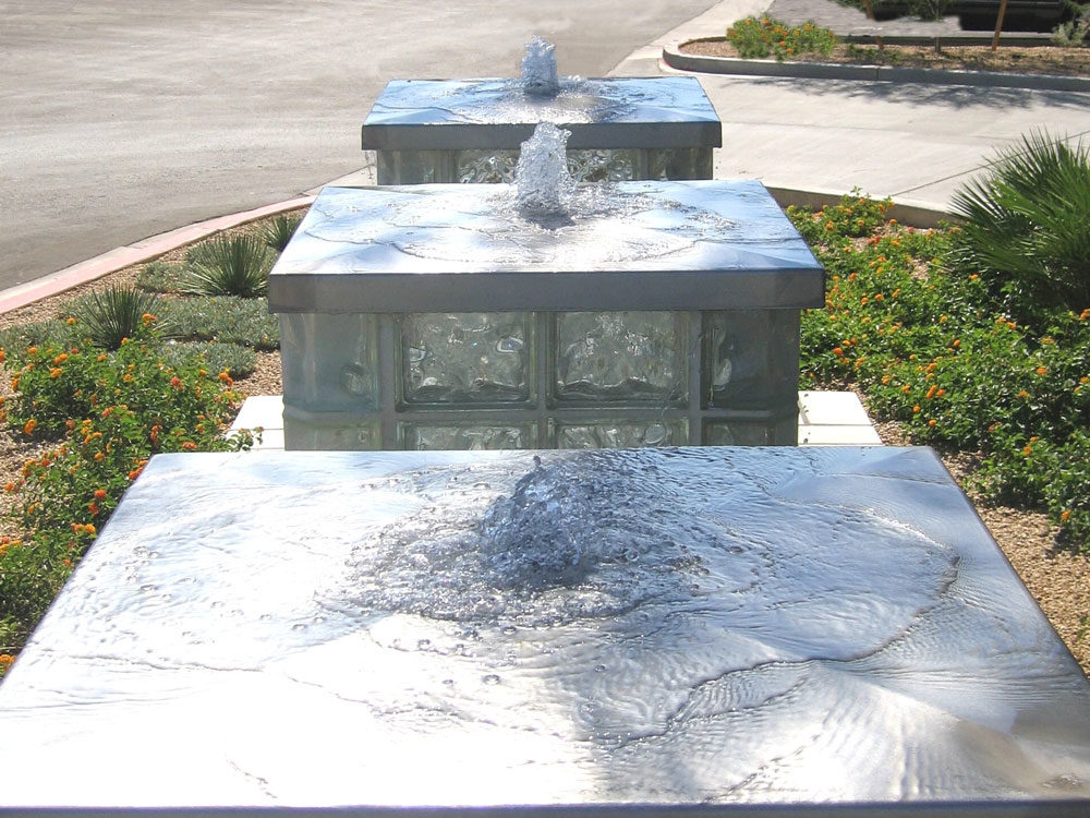 Commercial water features. Stainless steel caps.