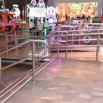 Scope: Custom Illuminated bar rack and illuminated glass guardrails. Contractor: A. R. Mays